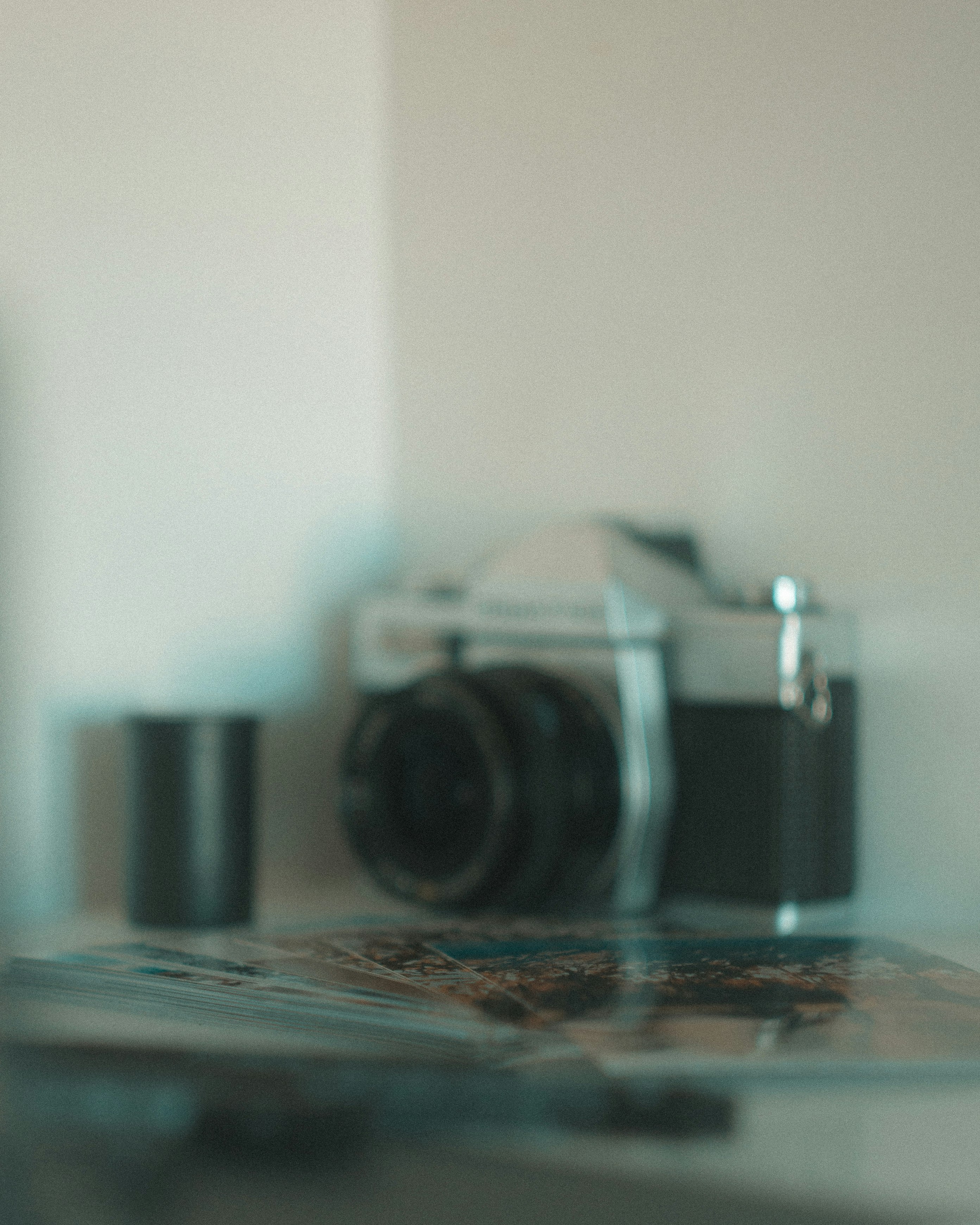 black and silver camera on table